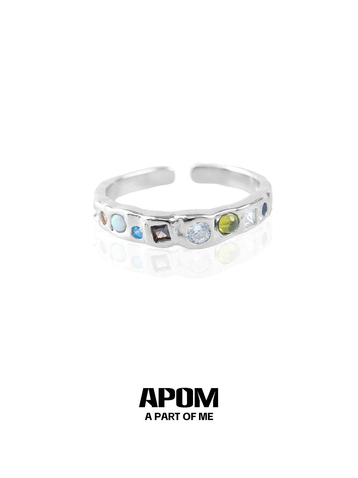 A PART OF ME rainbow gemstone ring featuring multiple colorful gemstones in a sleek silver band