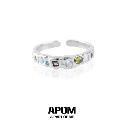 Silver rainbow gemstone ring featuring a variety of colorful stones for a vibrant look