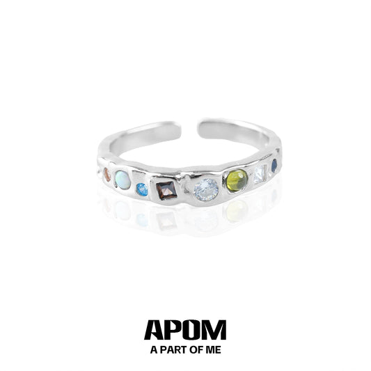 Silver rainbow gemstone ring featuring a variety of colorful stones for a vibrant look