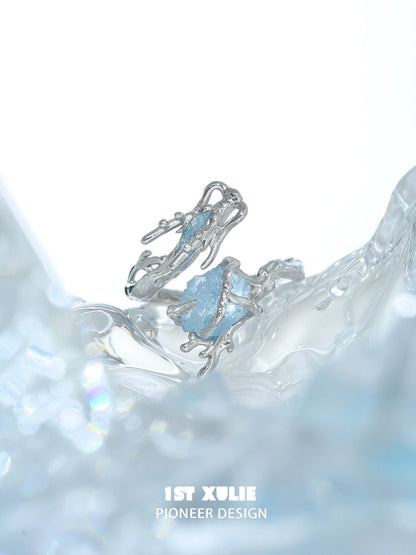 Stylish aquamarine dragon ring in silver design, showcasing intricate detailing and a unique gemstone