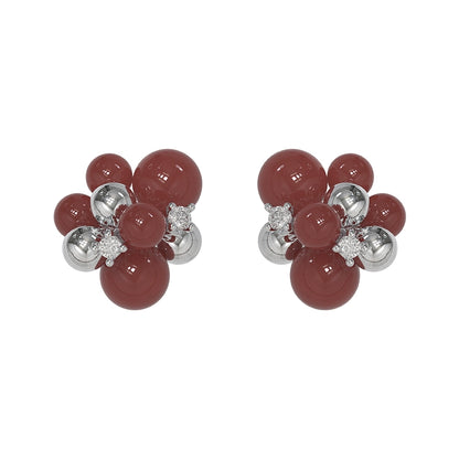 Elegant black agate earrings featuring a unique cluster design with sparkling accents