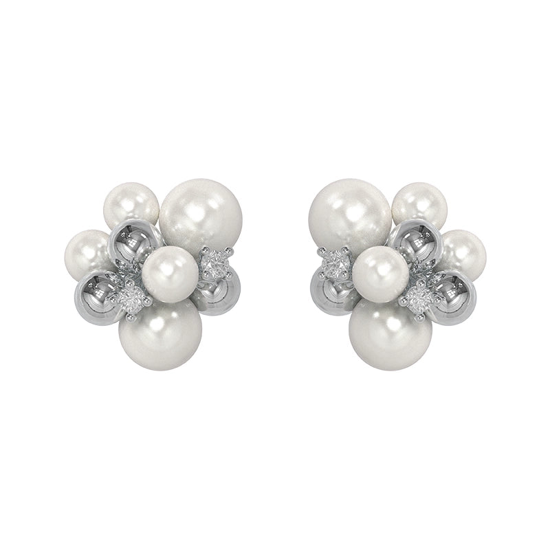 Elegant black agate earrings with a unique design featuring lustrous pearls and silver accents