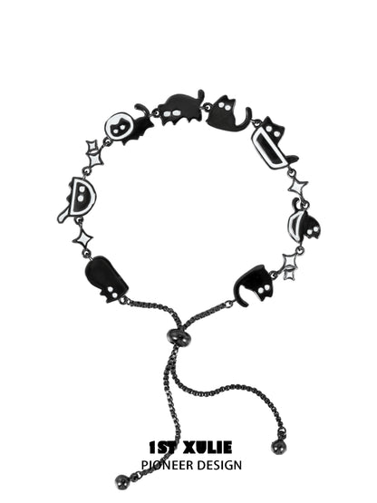 Black cat bracelet with playful cat and ghost charms for cat lovers and fashion enthusiasts