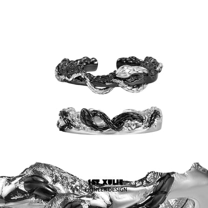 Artistic black snake couple rings designed by 1STXULIE in a unique intertwined style