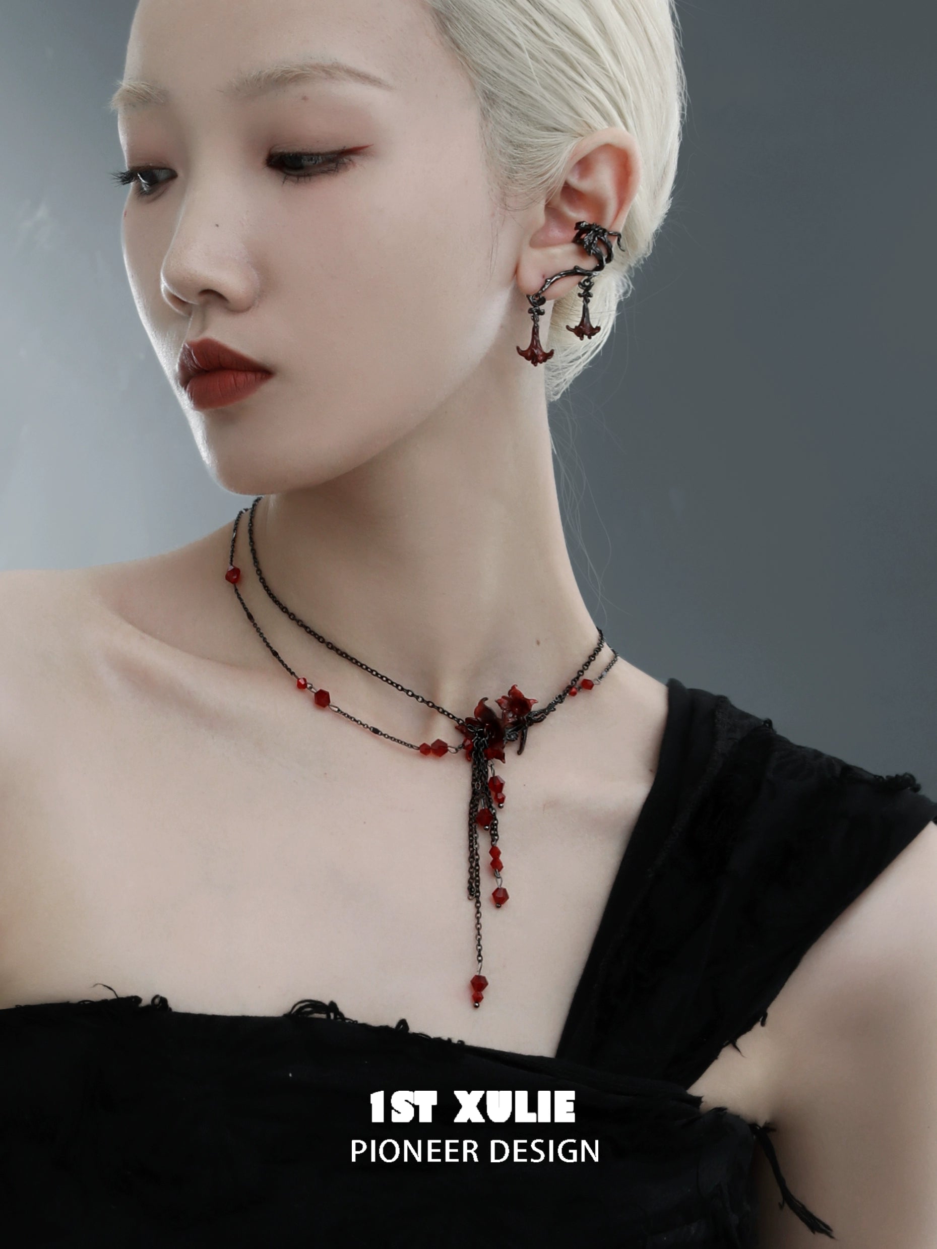 Stylish blood mandala tassel necklace featuring intricate red and black beads for a unique accessory
