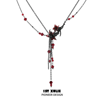 Blood mandala tassel necklace with intricate design and elegant red accents for a stylish look