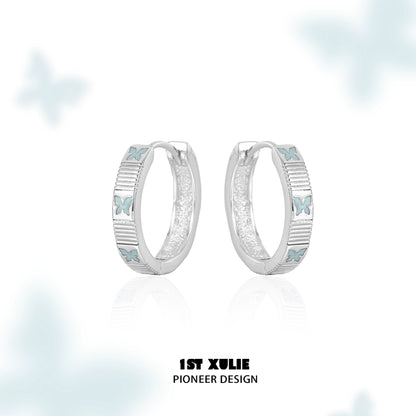 Elegant silver hoop earrings featuring blue butterfly earrings for a stylish look