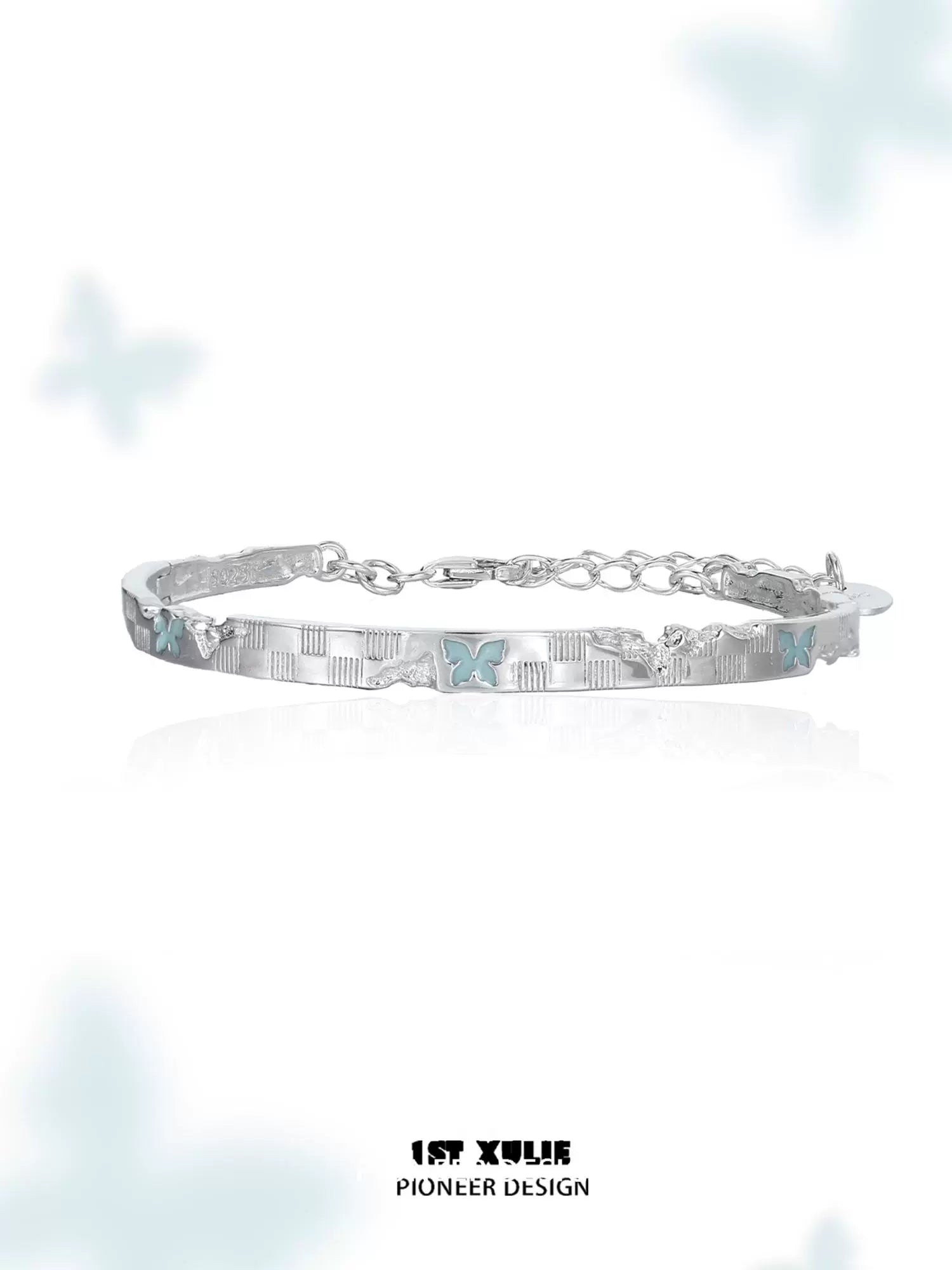 Elegant blue butterfly silver bracelet featuring intricate butterfly designs and a delicate chain.