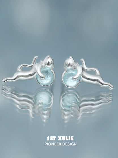 Unique silver blue kitten earrings for women featuring playful cat design and light blue accents