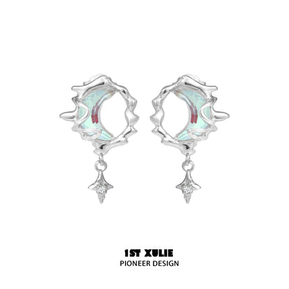 Stylish blue moon silver earrings with intricate design and sparkling details