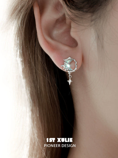 1ST XULIE Blue Moon Silver Earrings featuring a unique design with a dangling charm
