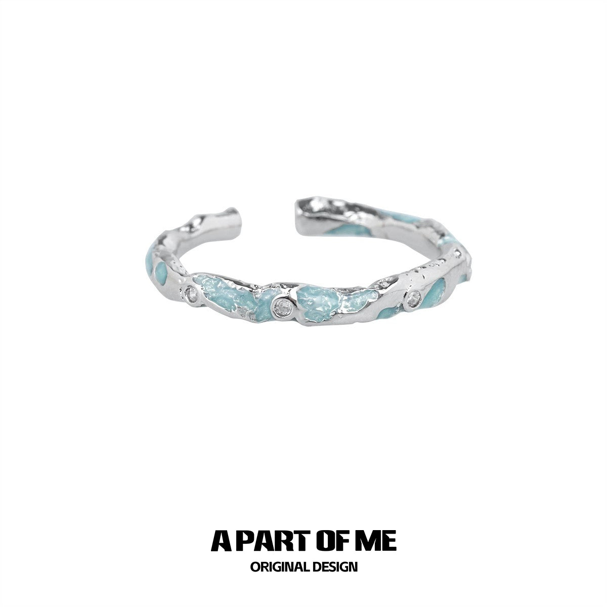 A PART OF ME broken starry sky ring with a textured silver design and blue accents