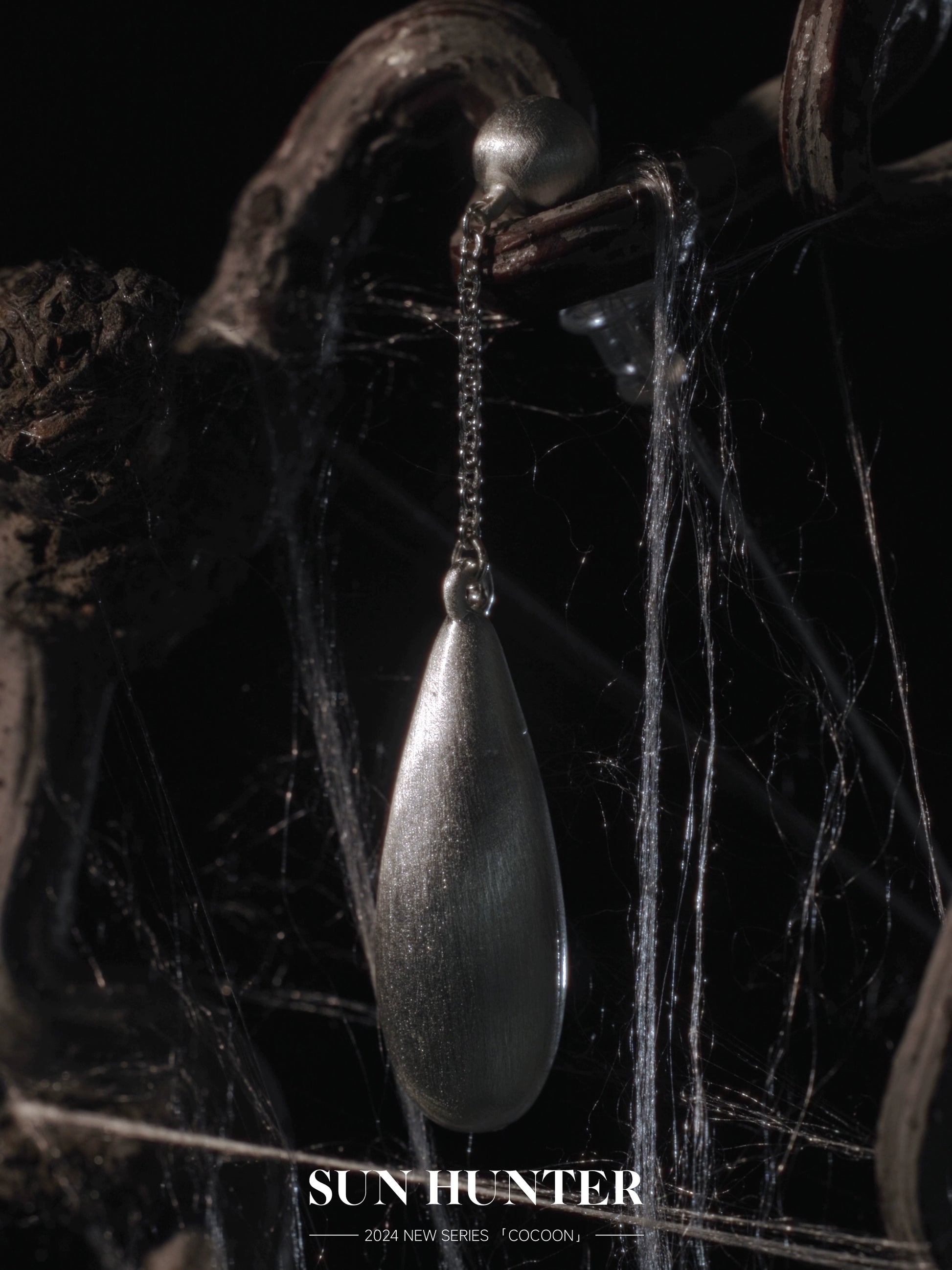 Elegant brushed teardrop earrings by SUN HUNTER with a sleek design for a modern look