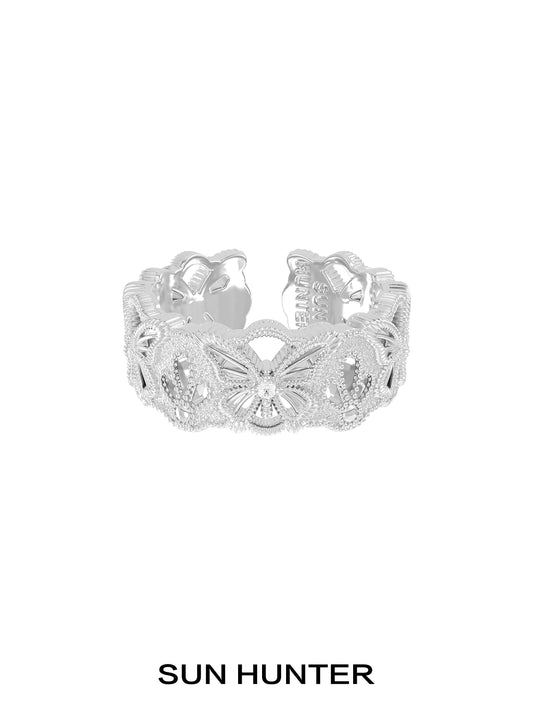 Elegant silver butterfly hollow ring by SUN HUNTER with intricate lace design
