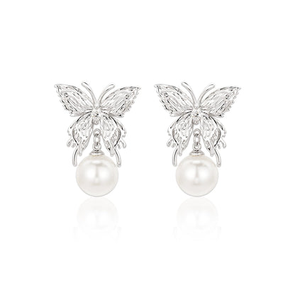 SUN HUNTER butterfly pearl earrings featuring elegant butterfly design with luminous pearls