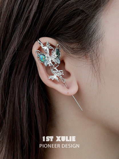 Stylish butterfly piercing earrings designed by 1ST XULIE with intricate details and vibrant colors