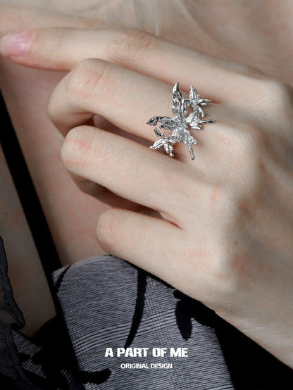 A Part of Me butterfly punk ring in silver with intricate butterfly design on hand