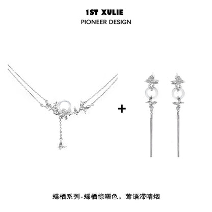 Elegant butterfly silver necklace featuring intricate design and sparkling details for a stylish look
