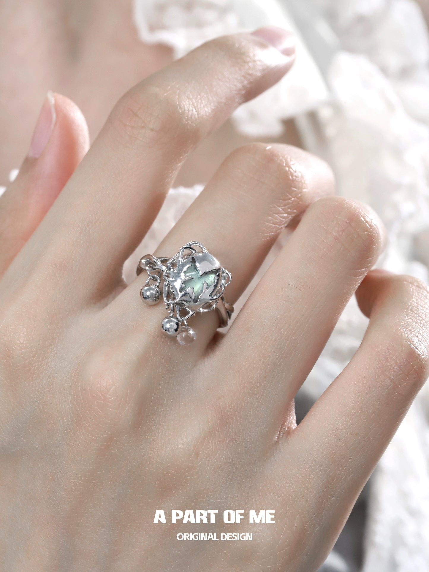 A PART OF ME butterfly silver ring featuring a stunning gemstone and intricate detailing on the band