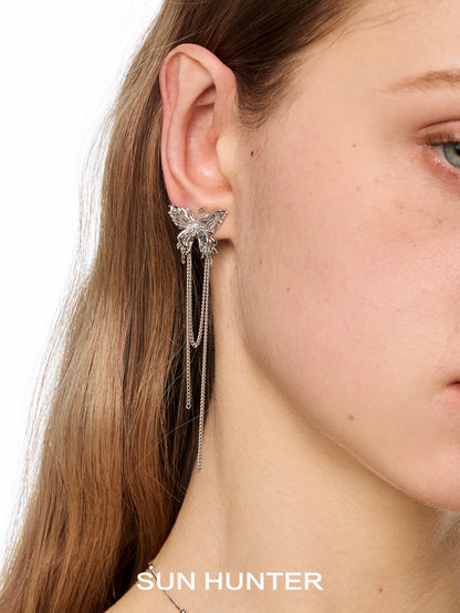SUN HUNTER butterfly tassel ear cuffs featuring intricate butterfly design and elegant chains