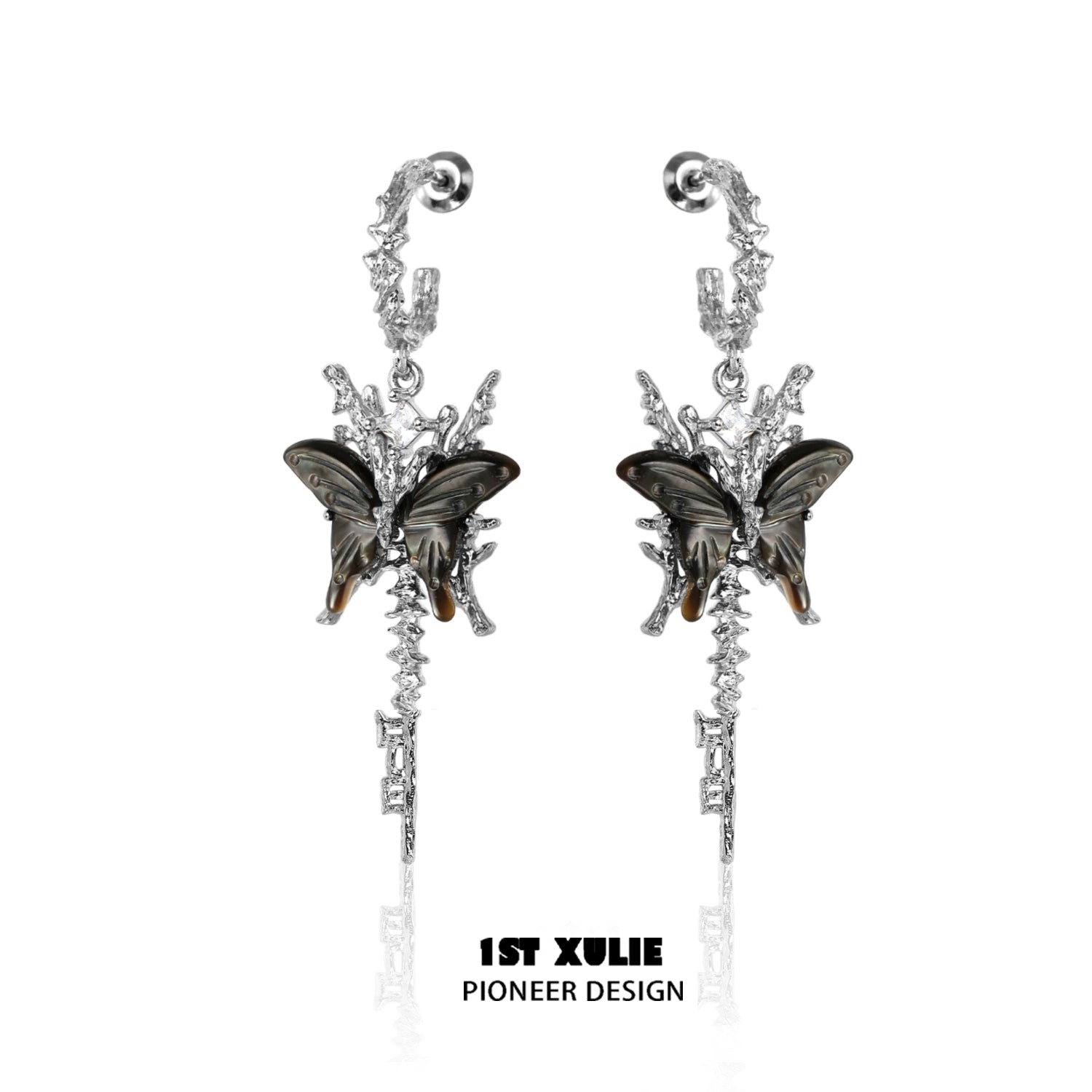 Elegant butterfly tassel shell earrings in silver with intricate design and butterfly accents