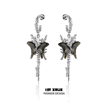 Elegant butterfly tassel shell earrings in silver with intricate design and butterfly accents
