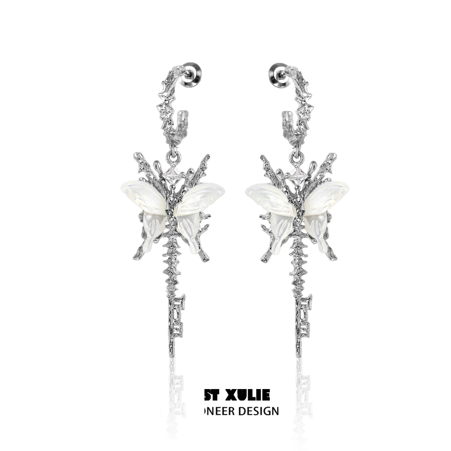 Stunning butterfly tassel shell earrings with intricate design and silver finish for elegant style