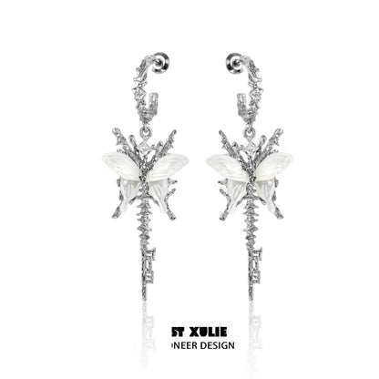 Stunning butterfly tassel shell earrings with intricate design and silver finish for elegant style