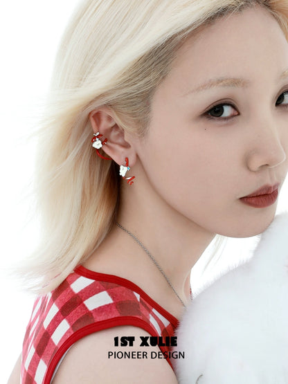 Charming cat and dog earrings by 1STXULIE showcased on a model with stylish hair