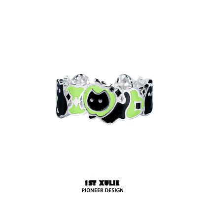 Unique cat and dog silver ring featuring playful designs in green and black for pet lovers
