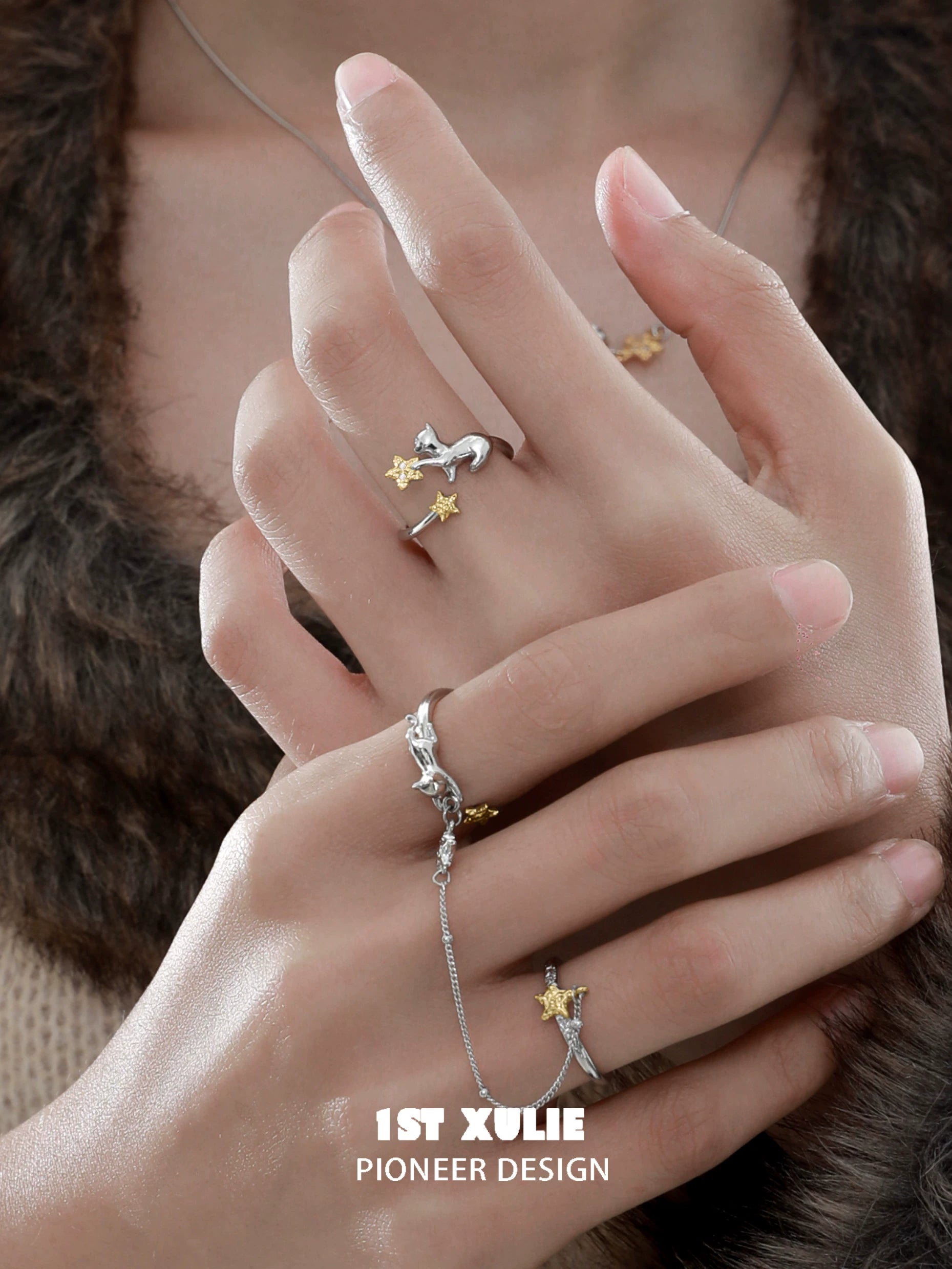 Cat silver ring from 1ST XULIE featuring a playful design with stars for cat lovers