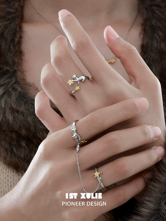 Cat silver ring from 1ST XULIE featuring a playful design with stars for cat lovers