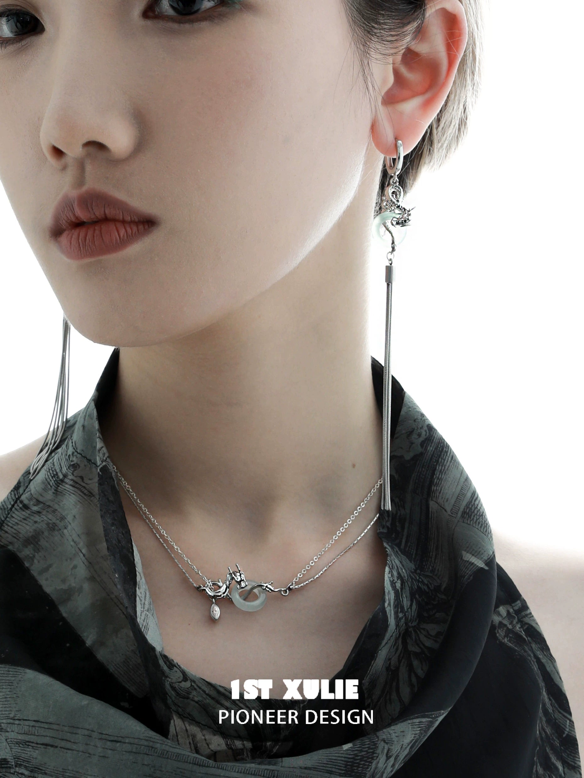 Elegant Chinese dragon tassel earrings featuring a sleek design and unique detailing