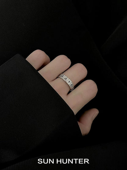 Elegant SUN HUNTER Chinese Mahjong ring displayed on a hand with dark attire