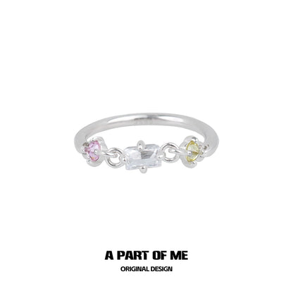 Colorful zircon ring featuring multicolored stones on a silver band for a stylish look