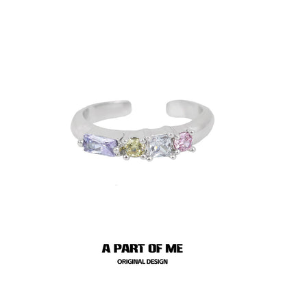 A PART OF ME colorful zircon ring featuring multi-colored gemstones on a sleek band