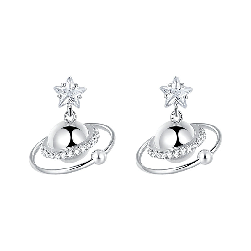 SUN HUNTER cosmic planet star earrings in silver with sparkling details and star accents