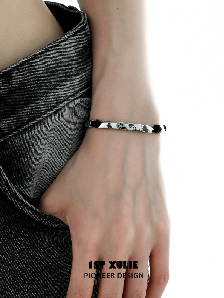 Stylish couple braided bracelet set featuring elegant design and adjustable fit