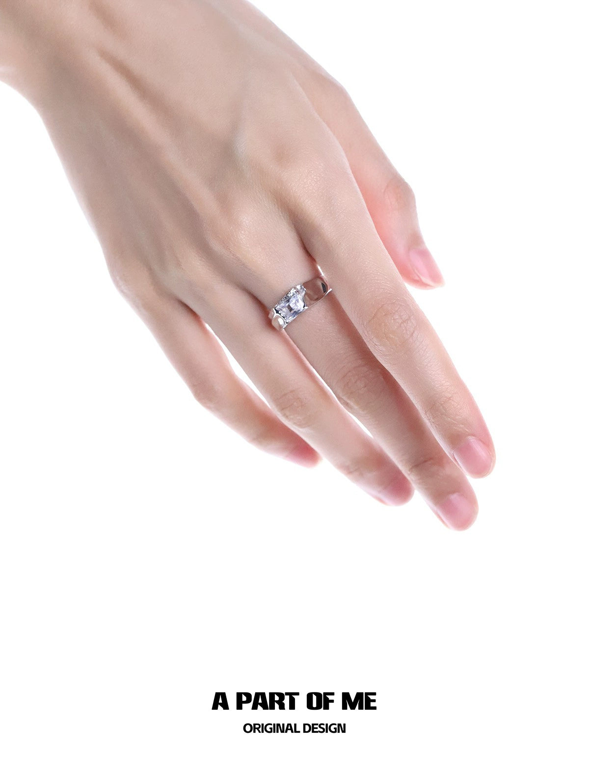 Cracked texture silver ring displayed on hand, showcasing its unique design and elegant look