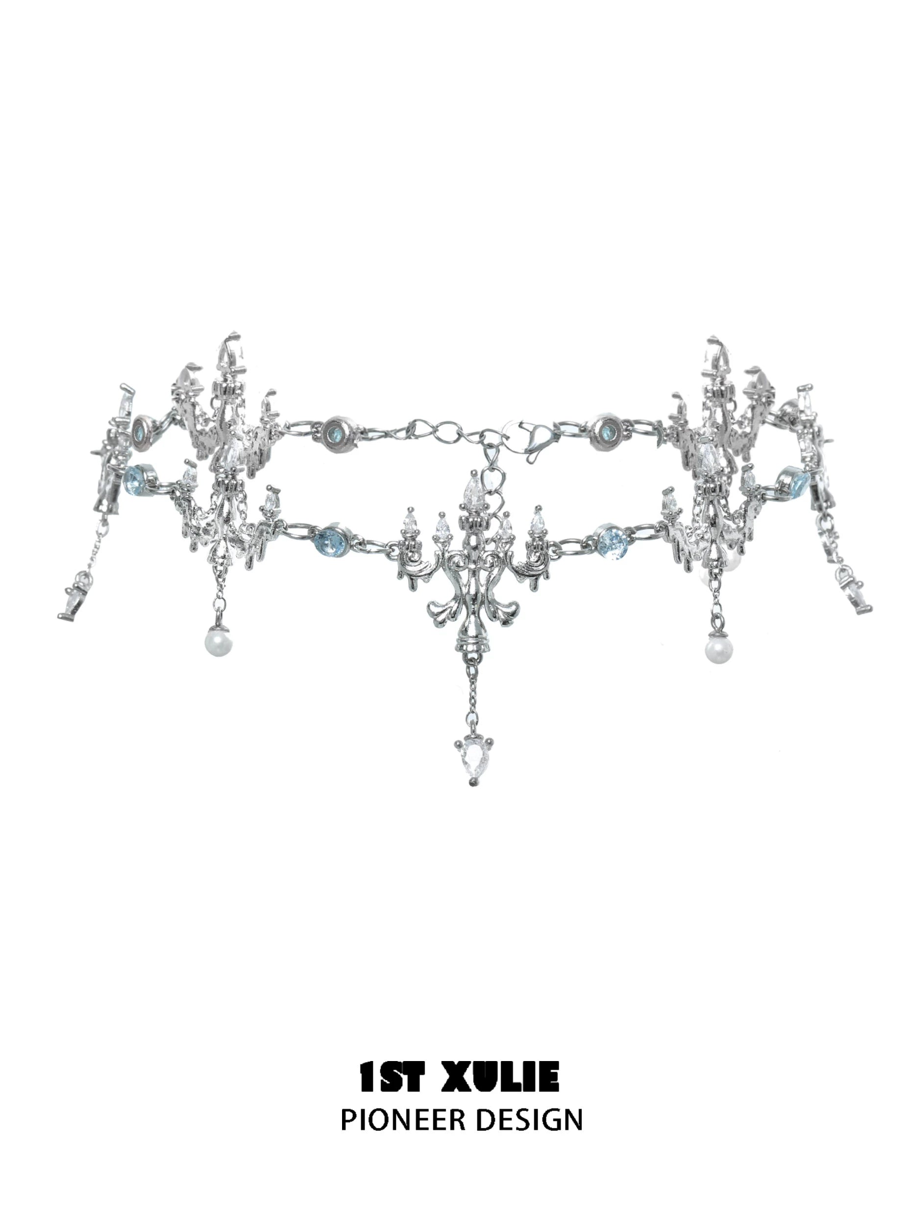 Elegant crystal fringe necklace adorned with silver accents and sparkling blue details