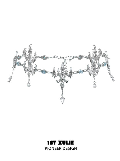 Elegant crystal fringe necklace adorned with silver accents and sparkling blue details