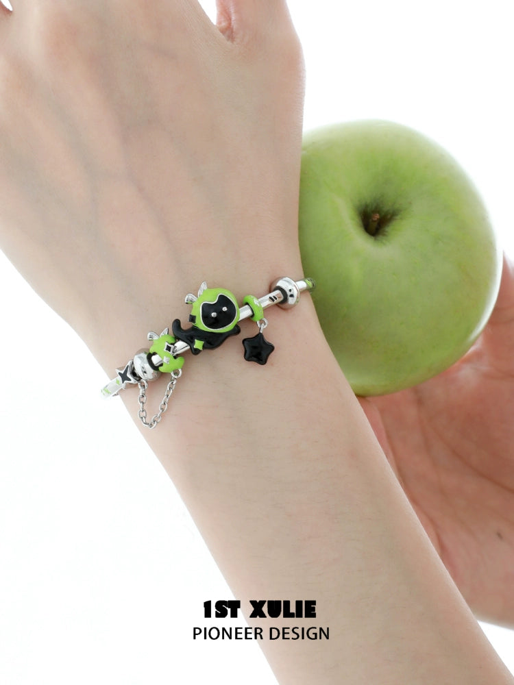 Cute cat and puppy bracelet in green and black featuring playful charms for animal lovers