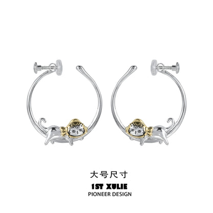 Cute cat hoop earrings featuring a playful cat design in silver and gold tones
