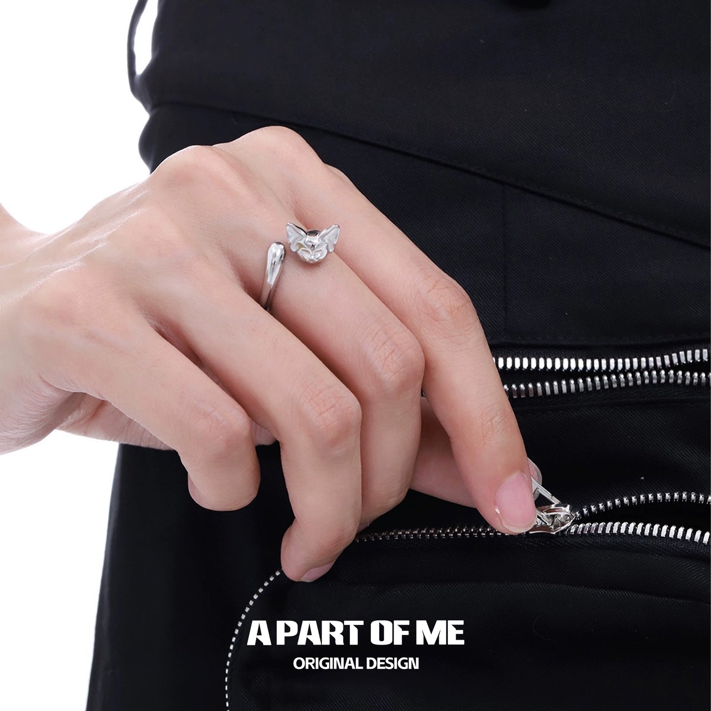 Cute cat tail silver ring displayed on a hand, showcasing its unique and original design