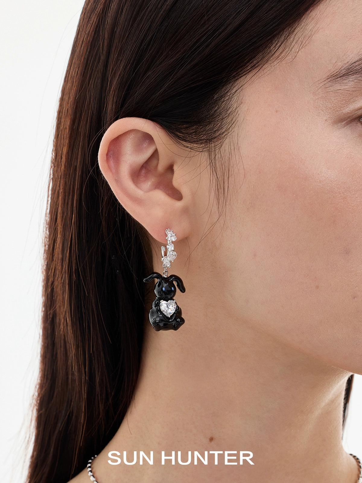 Cute enamel rabbit earrings from SUN HUNTER with a black bunny design and sparkling accents