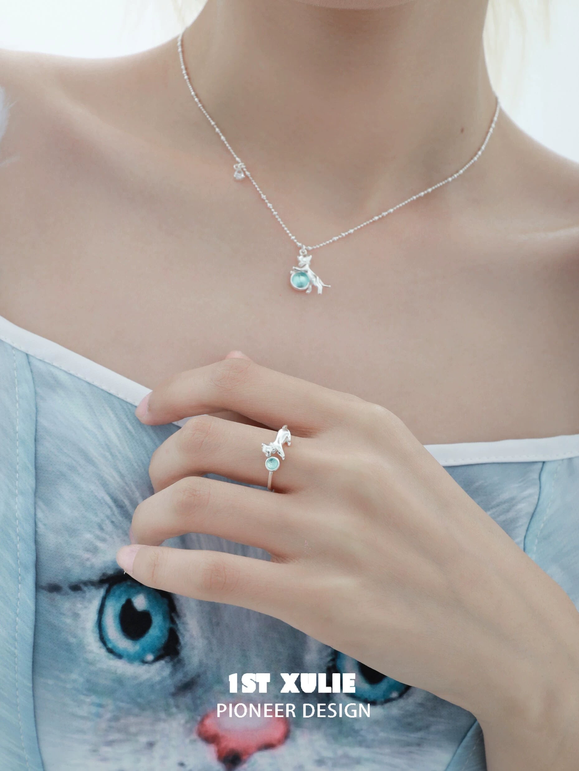 Cute kitten silver ring designed by 1ST XULIE, showcasing a charming feline detail