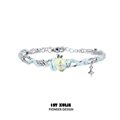 Cute snake apple bracelet with silver charm and blue accents for trendy accessory lovers