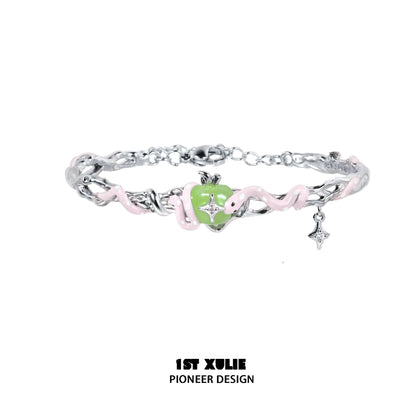 Cute snake apple bracelet featuring a playful snake and apple charm in vibrant colors