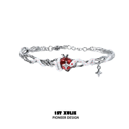 Cute snake apple bracelet from 1STXULIE featuring a silver chain and heart charm