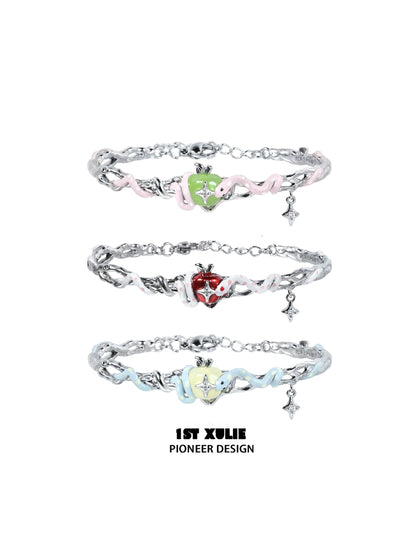 Cute snake apple bracelet in three colors featuring playful designs and a charming heart detail